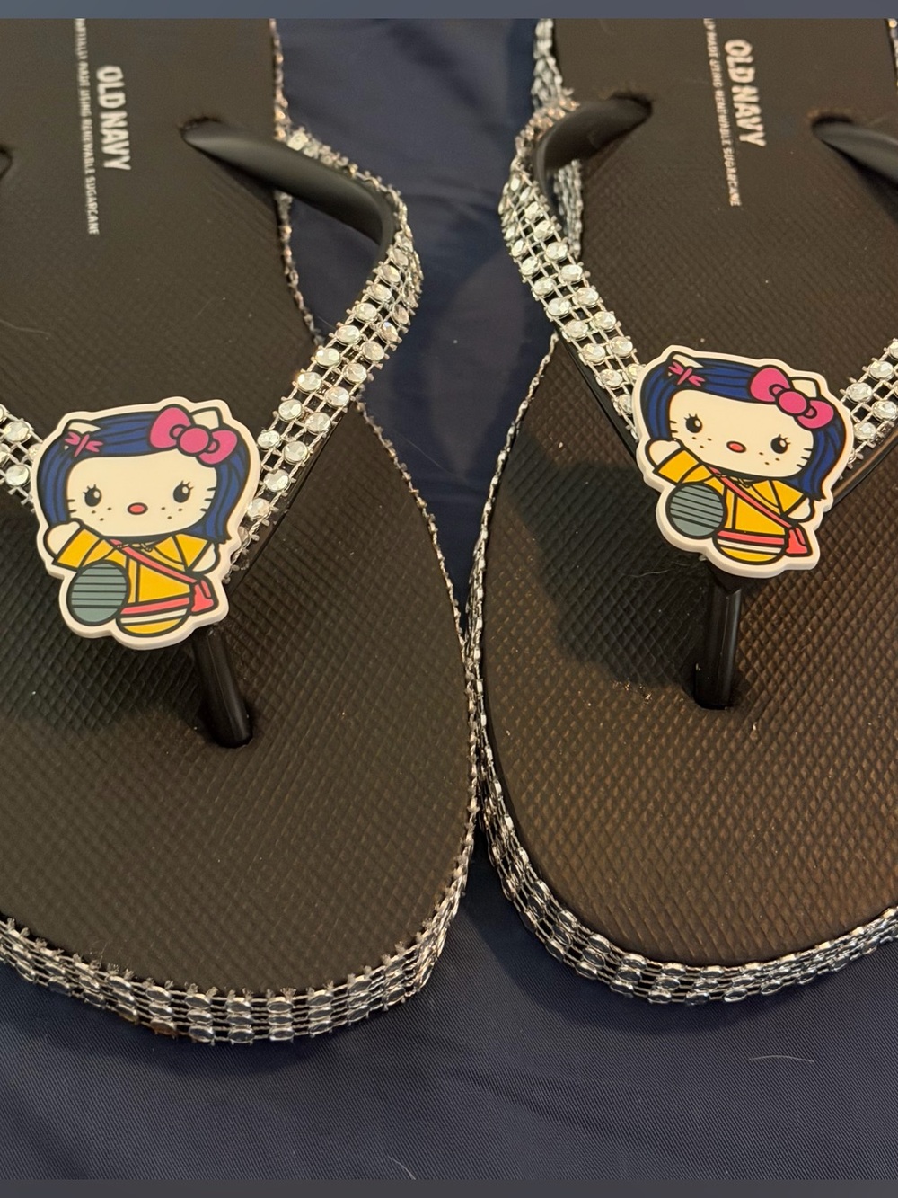 Old Navy Black Flip Flops with Cute Character Charm and Rhinestone Trim